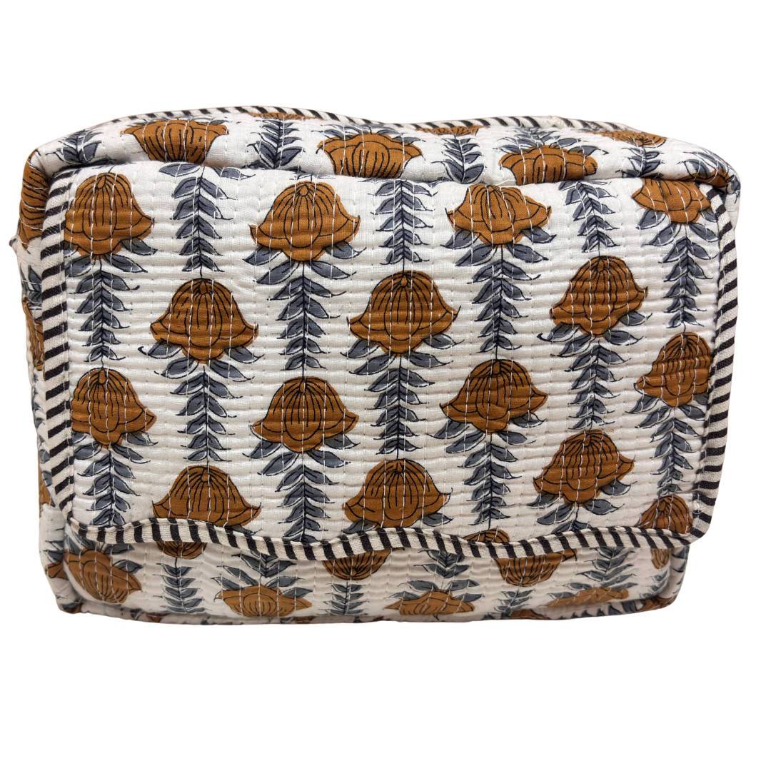 Handcrafted quilted cotton cosmetic case by RajPadmini — block-print travel makeup pouch with leak-proof parachute lining