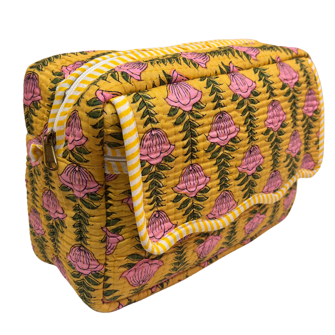 Quilted cotton travel makeup pouch by RajPadmini — angled view highlighting hand-block-printed design