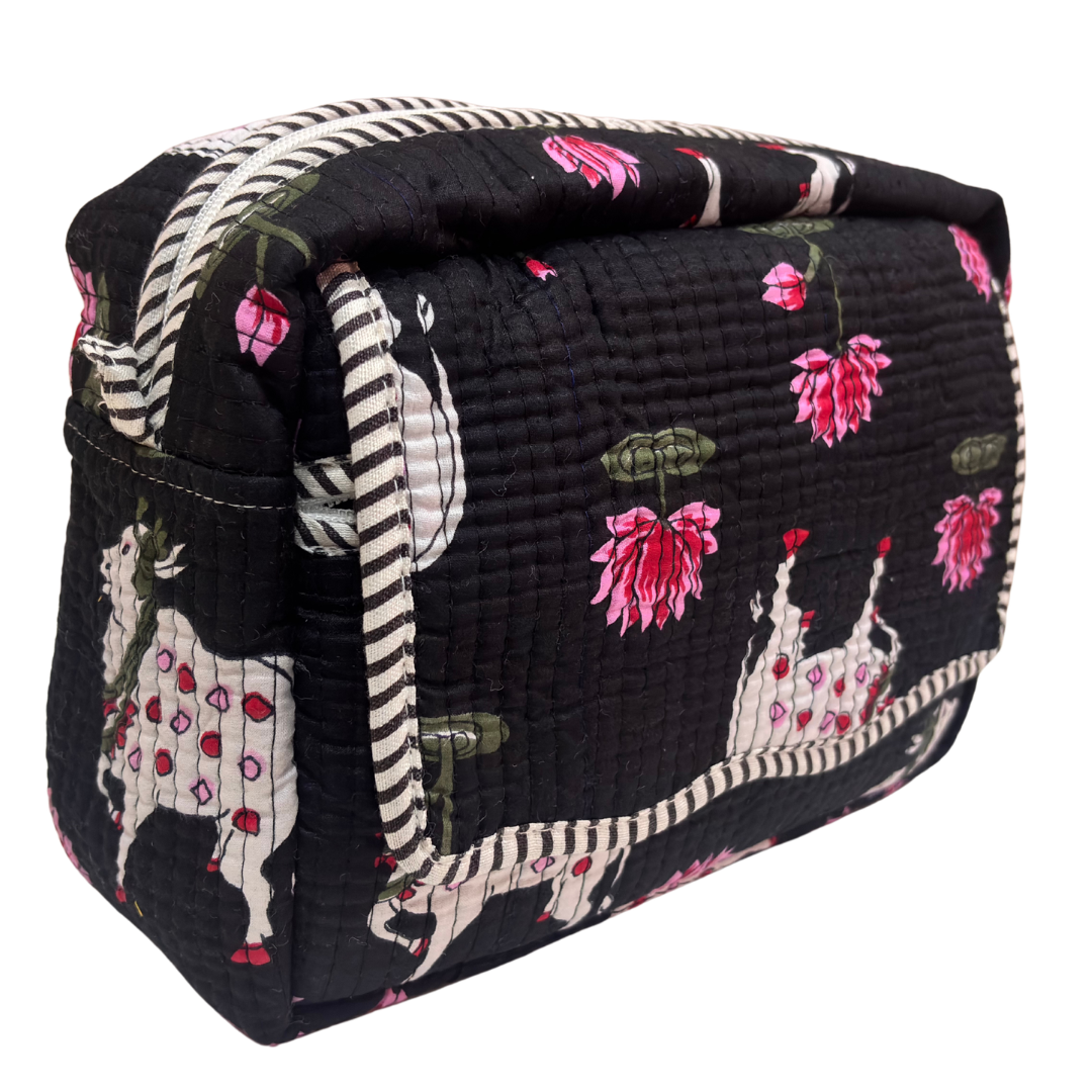 Quilted cotton travel makeup pouch by RajPadmini — angled view highlighting hand-block-printed design