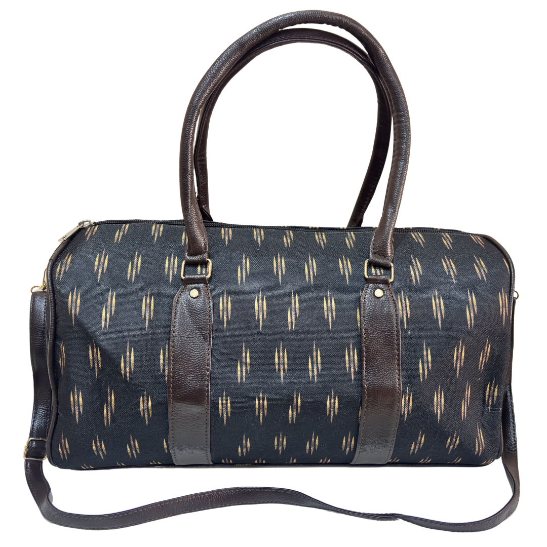 Side angle of black cotton blend duffle bag showing riveted base, side pocket and zipper closure