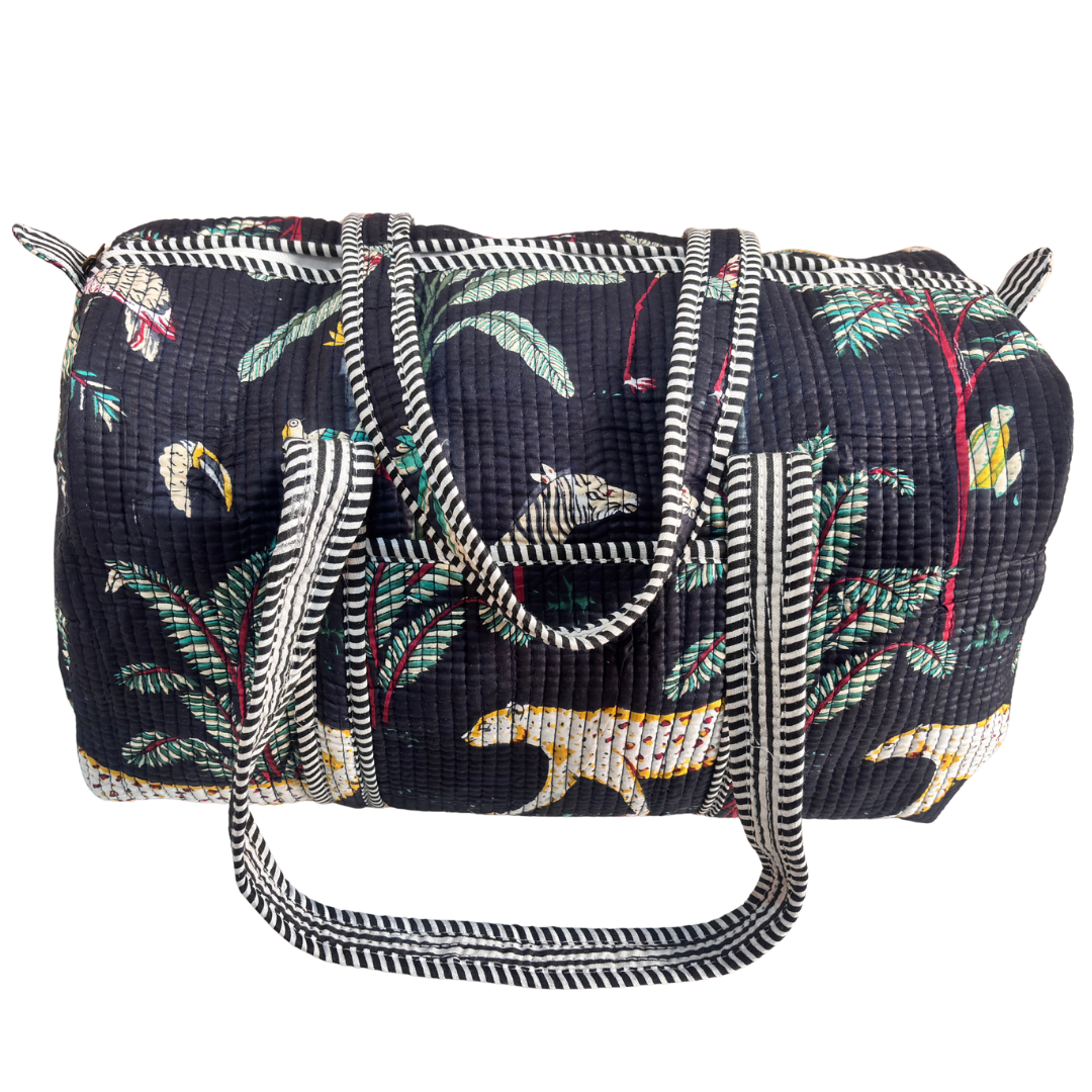 Side view of Pushkar Balloon quilted duffle (Black variant) showing zipper closure and reinforced base