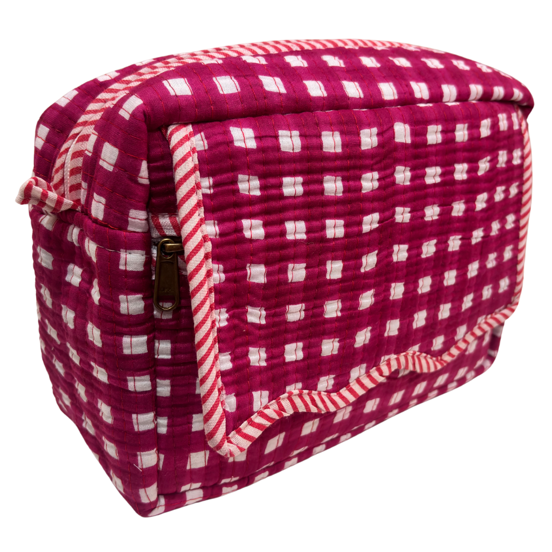 Quilted cotton travel makeup pouch by RajPadmini — angled view highlighting hand-block-printed design