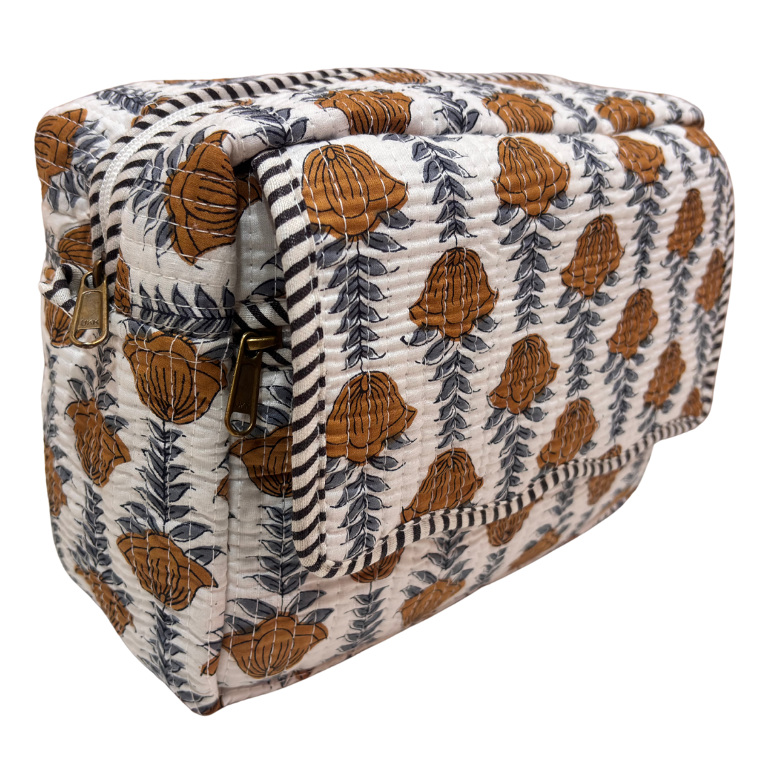 RajPadmini block-print cosmetic case — front view showing quilted cotton exterior and sturdy zip closure