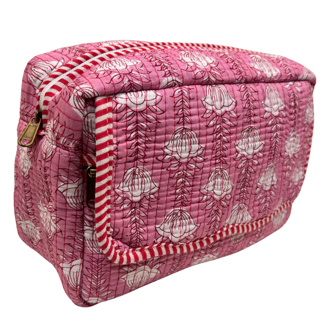 Quilted cotton travel makeup pouch by RajPadmini — angled view highlighting hand-block-printed design