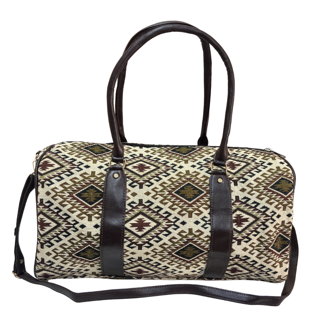 Side view of white and brown cotton duffle showing riveted base, side pocket and zipper closure