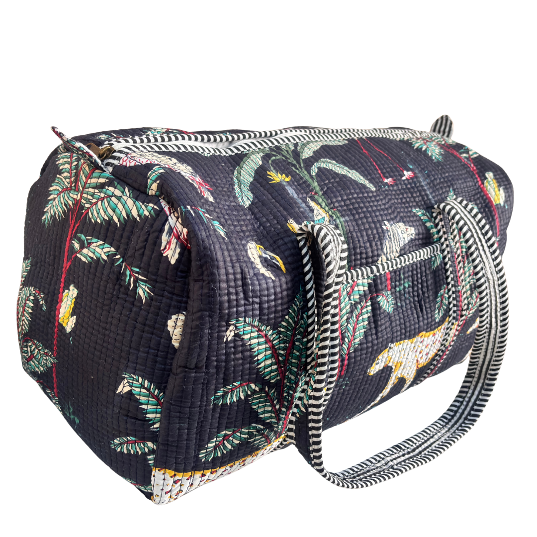 Close-up of quilted cotton fabric on Pushkar Balloon Black quilted duffle by RajPadmini
