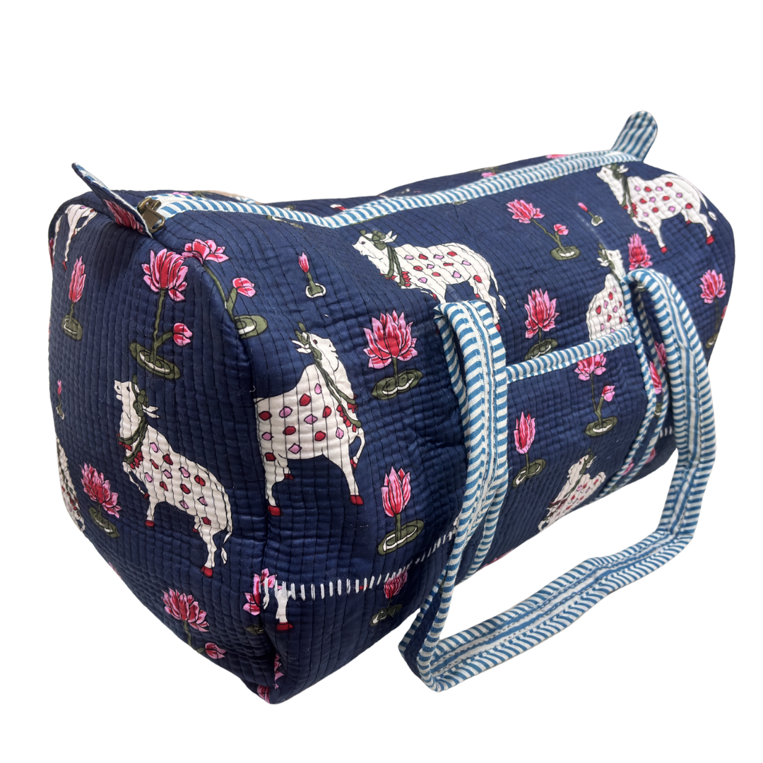 Close-up of quilted cotton fabric on Pushkar Balloon Blue duffle by RajPadmini