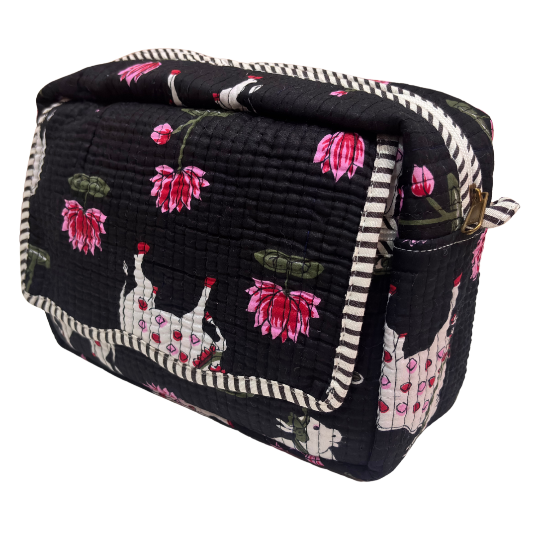 Interior view of RajPadmini cosmetic case — leak-proof parachute-fabric lining with four patch pockets