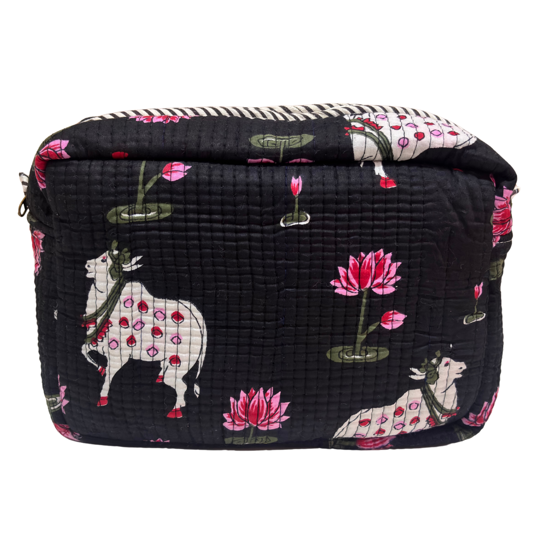 RajPadmini toiletry pouch — front zip pocket detail for quick-access essentials