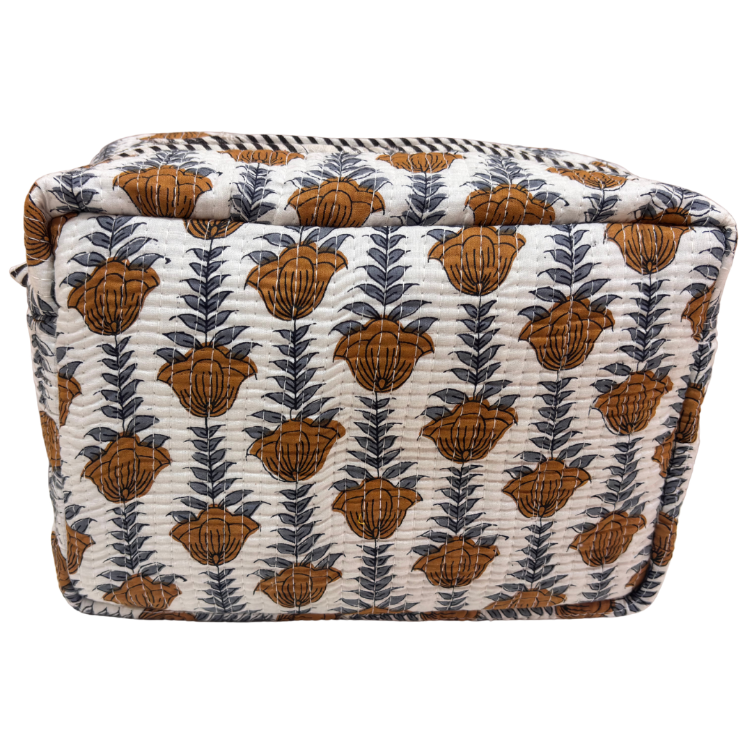 Interior view of RajPadmini cosmetic case — leak-proof parachute-fabric lining with four patch pockets
