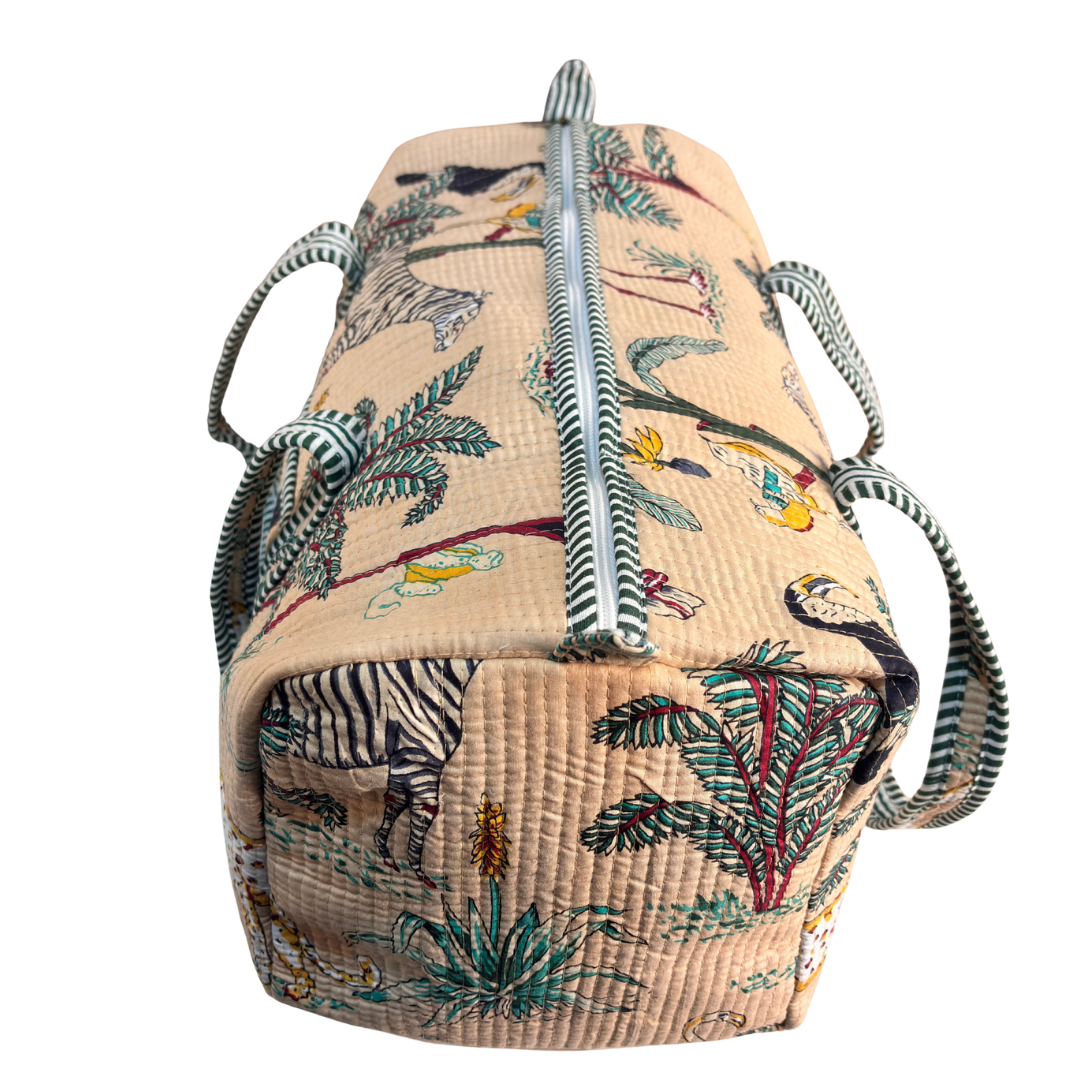 Interior view of Pushkar Balloon quilted duffle (Animal Print Off-White) with zip pocket and lining