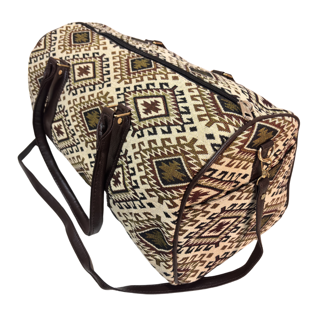 Top handles and zipper closure on Desert Trail white-and-brown cotton duffle