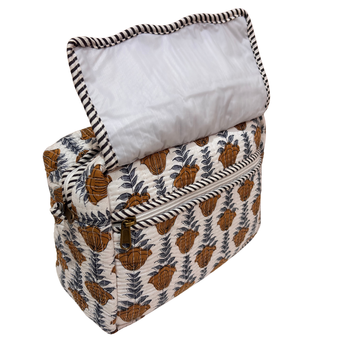RajPadmini toiletry pouch — front zip pocket detail for quick-access essentials