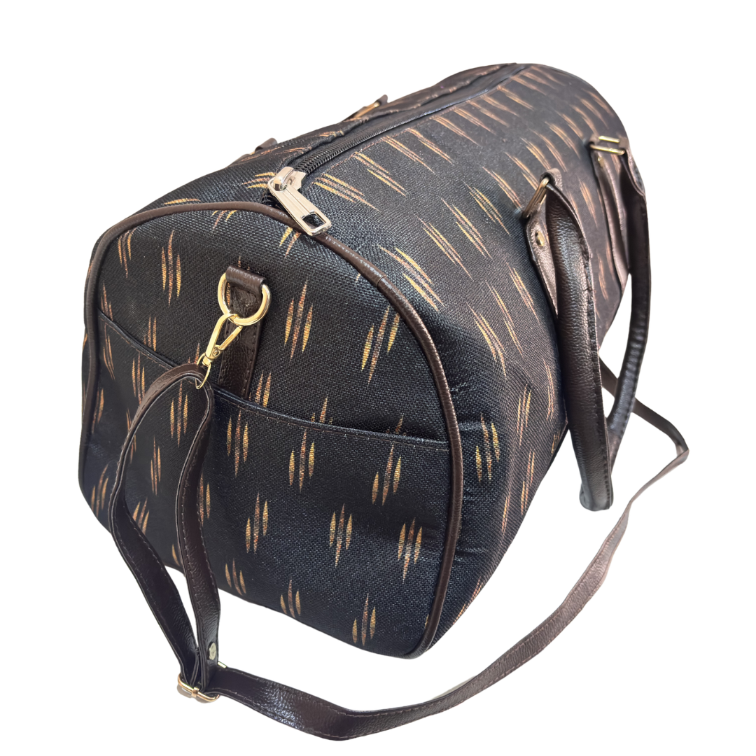 Top handles and YKK-style zipper detail on Midnight Noir black travel duffle