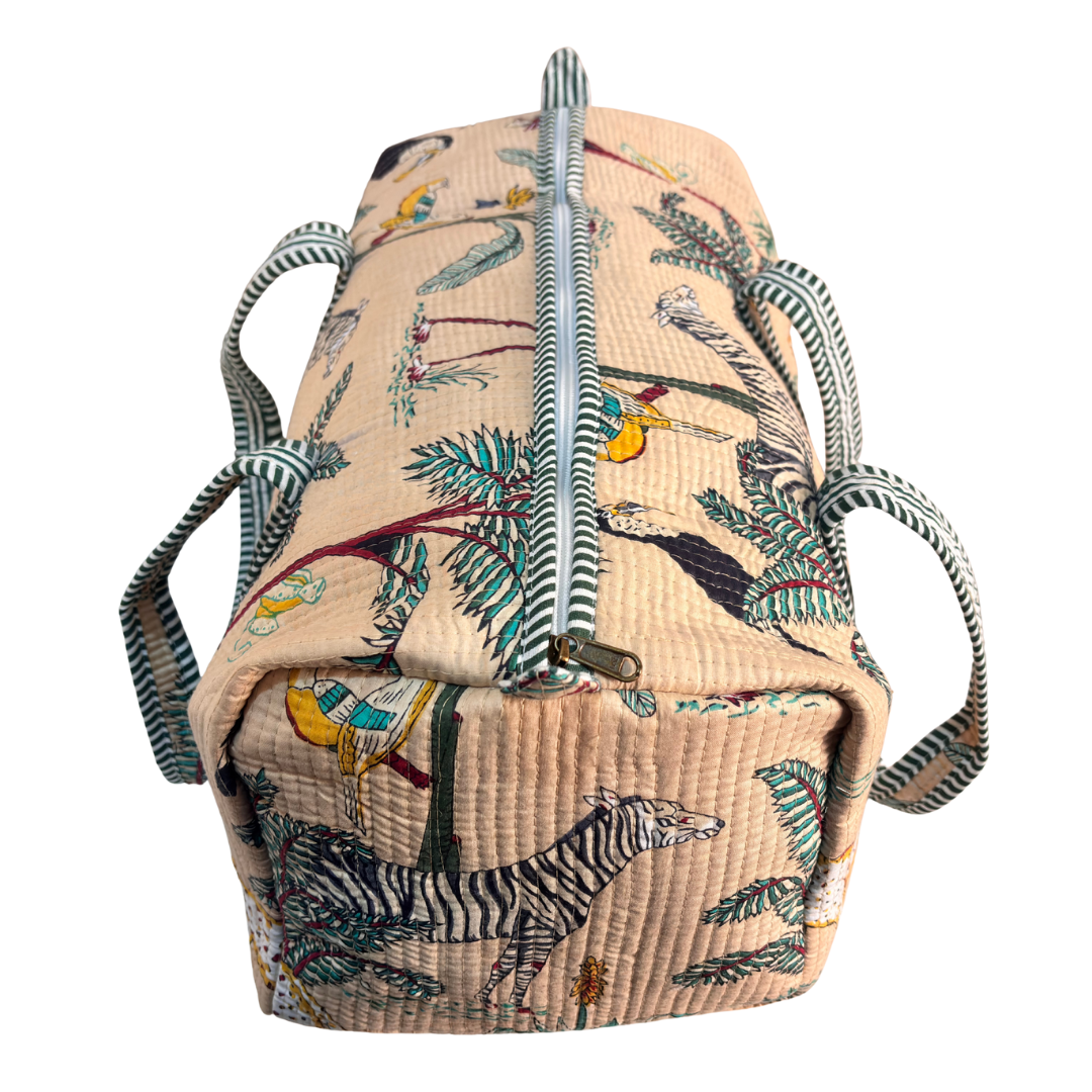 Reinforced base of Pushkar Balloon Animal Print Off-White duffle — cabin-friendly travel bag