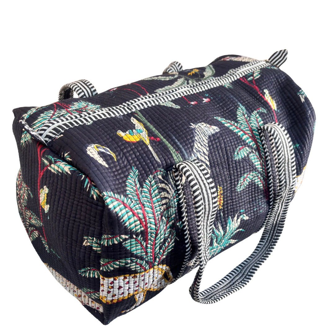 Reinforced base of Pushkar Balloon Black quilted duffle — cabin-friendly travel duffle bag