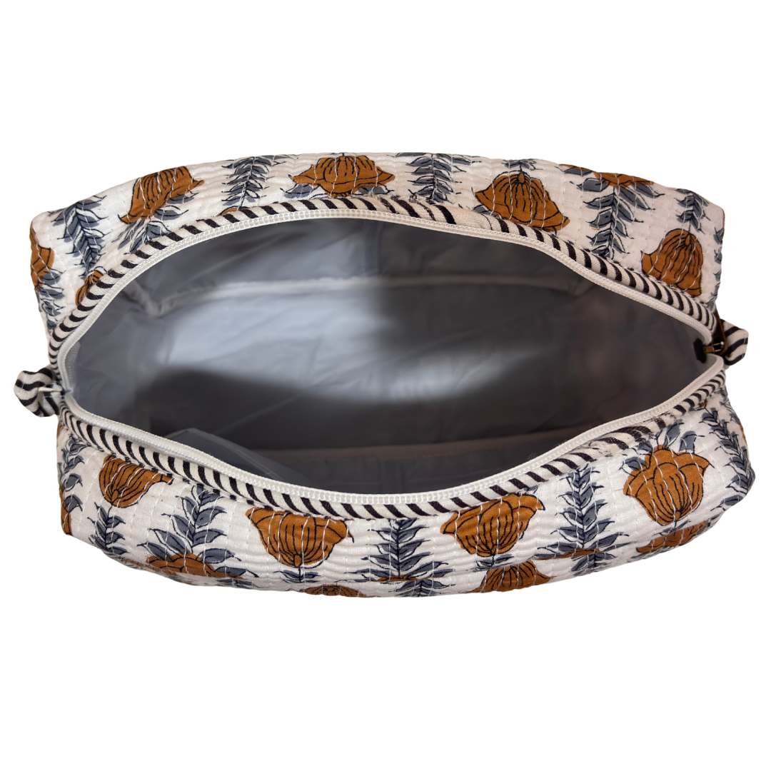 RajPadmini quilted cotton travel organiser — close-up of hand-block-printed pattern detail