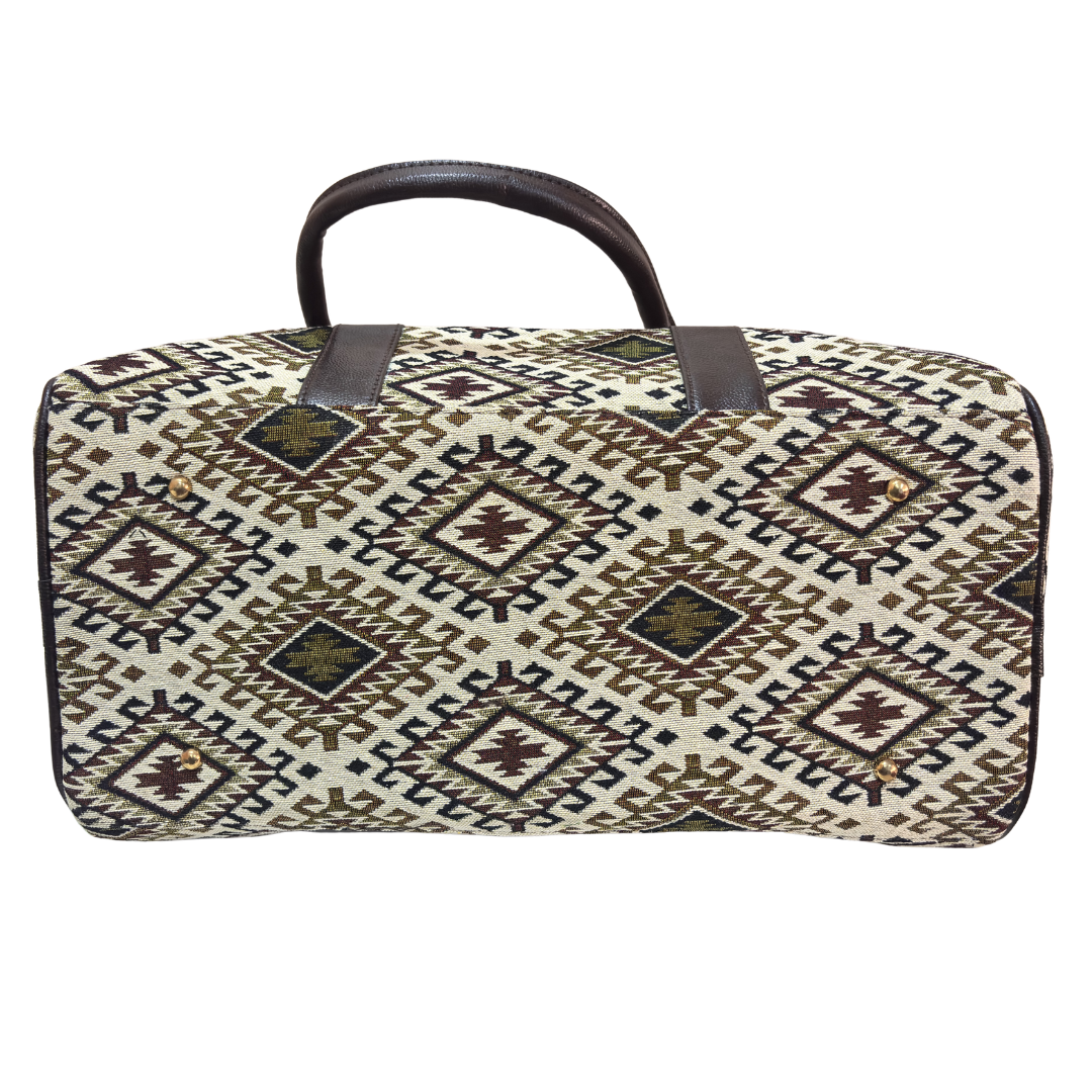White and brown cotton blend duffle bag styled for heritage stays and weekend travel