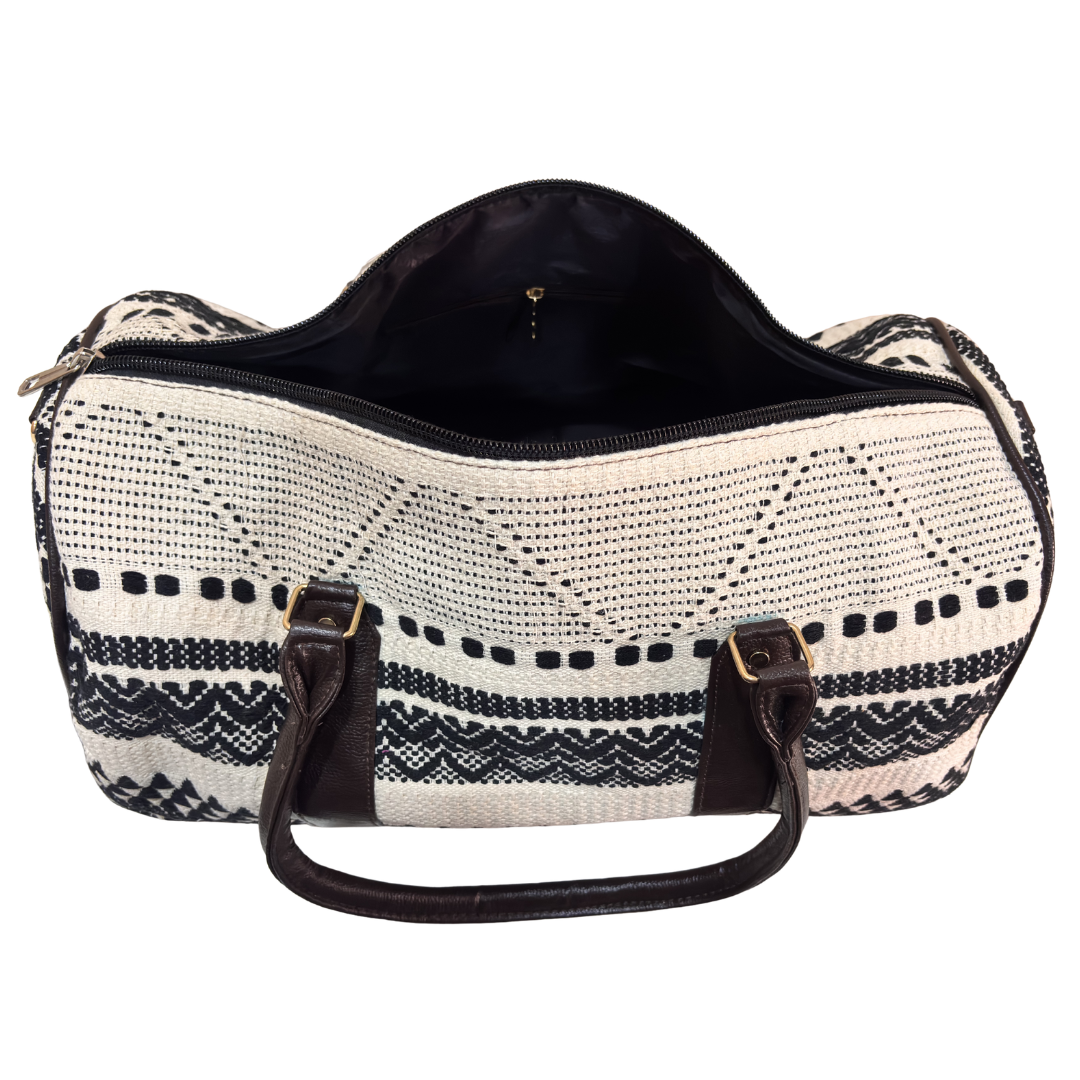 Detail of woven black-and-white jacquard pattern on RajPadmini handcrafted duffle